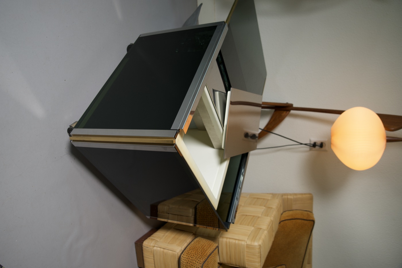 Chrome and smoked glass bar cart in the room